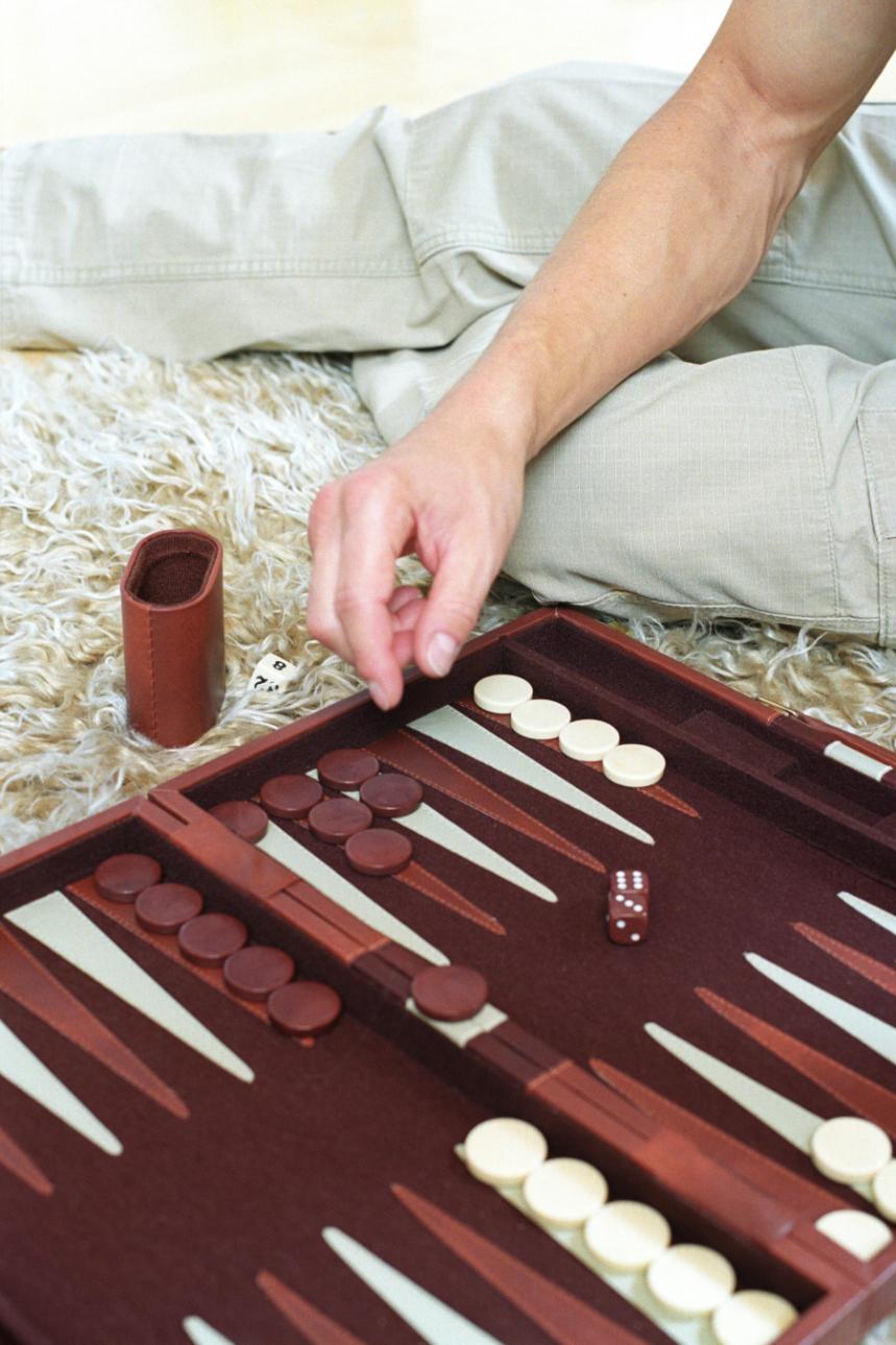 Hand auf Backgammonfeld, BACKGAMMON-AMBERG.DE